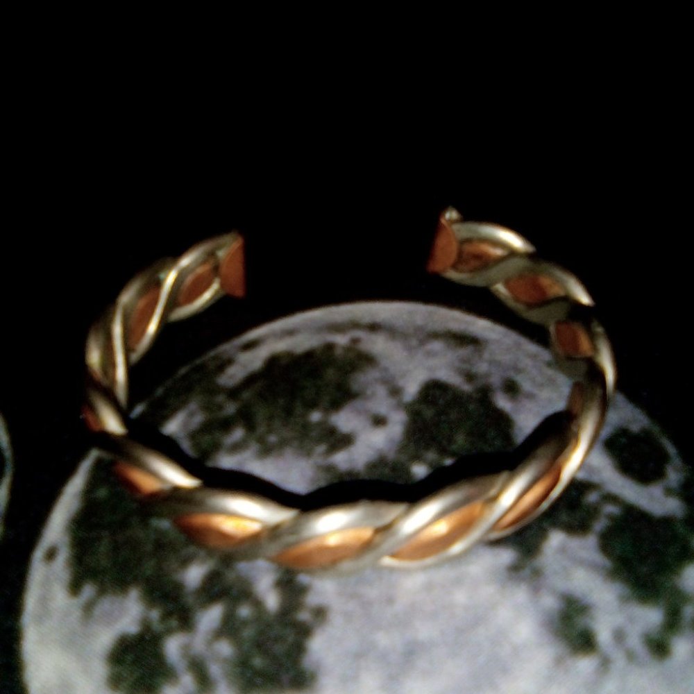 4/ $20 Copper and stainless steel twisted bracelet